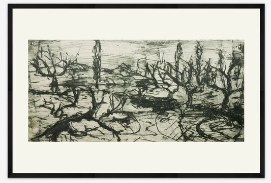 Framed black and white artwork of trees and a path on a textured background