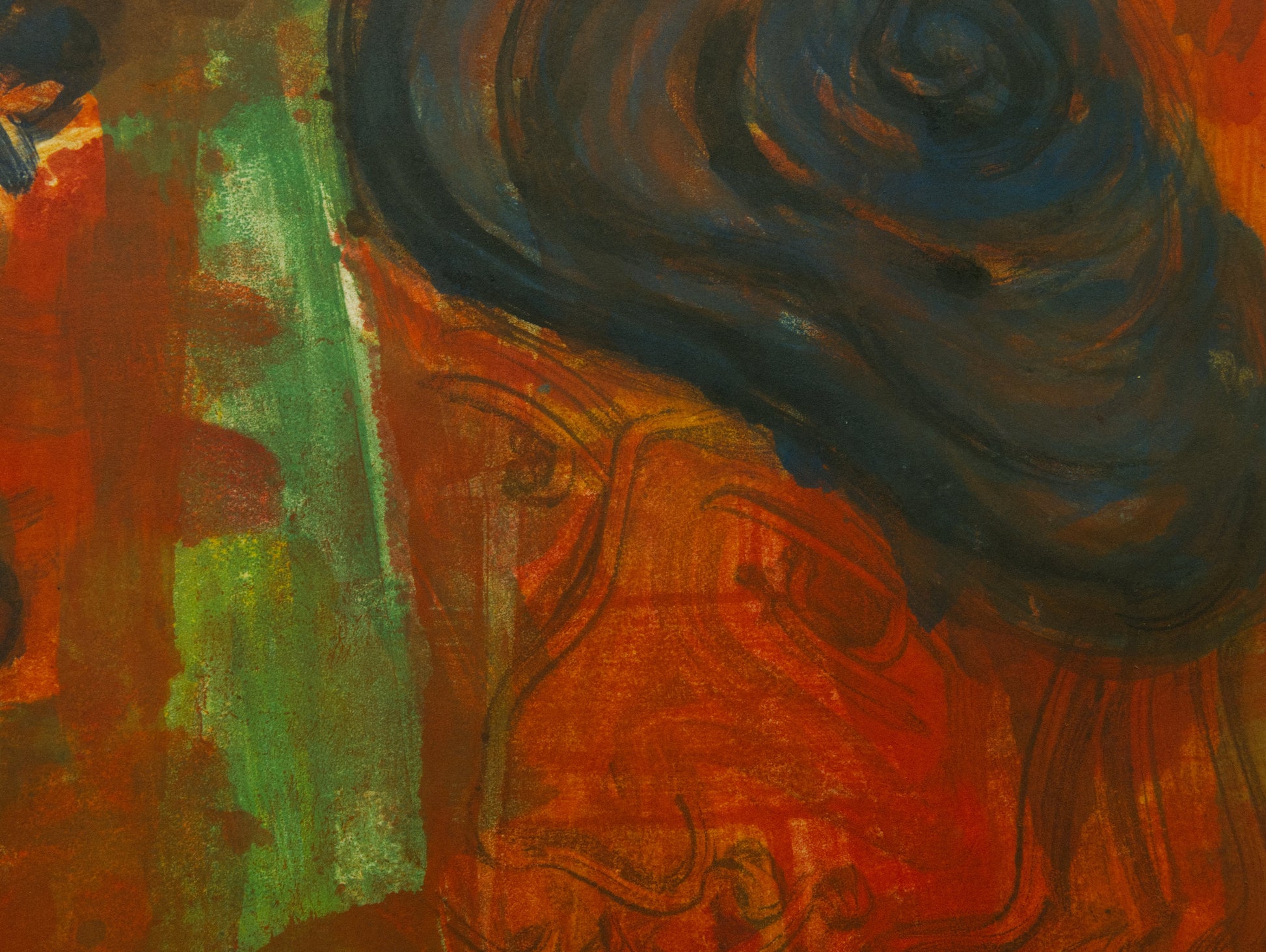 Close-up of a textured surface with swirling patterns in dark blue, green, and red.
